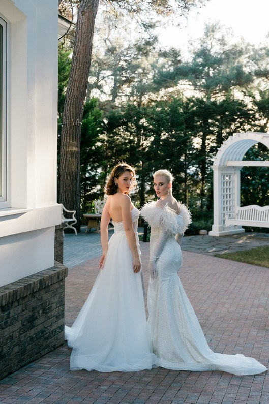 Bride and bridesmaids laughing at central London pub