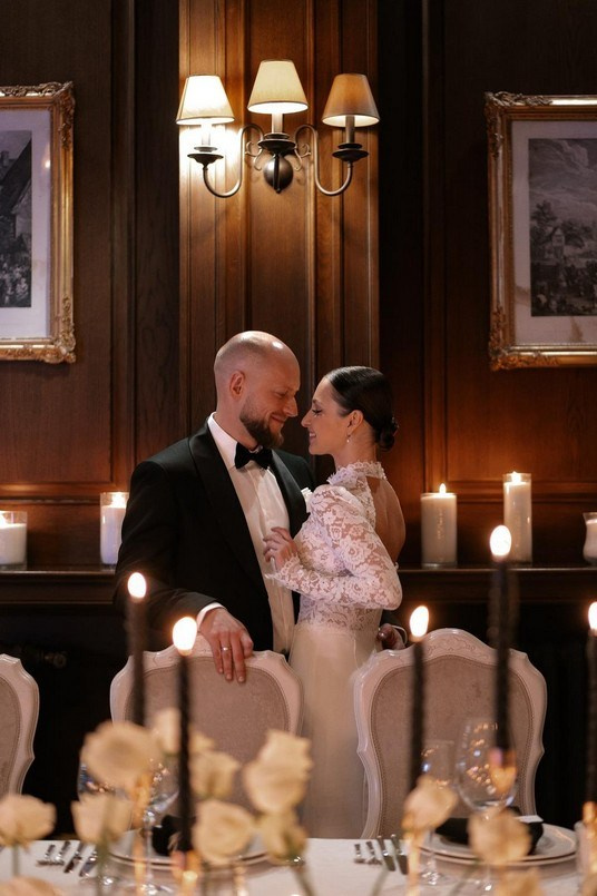 Couple’s first dance under string lights