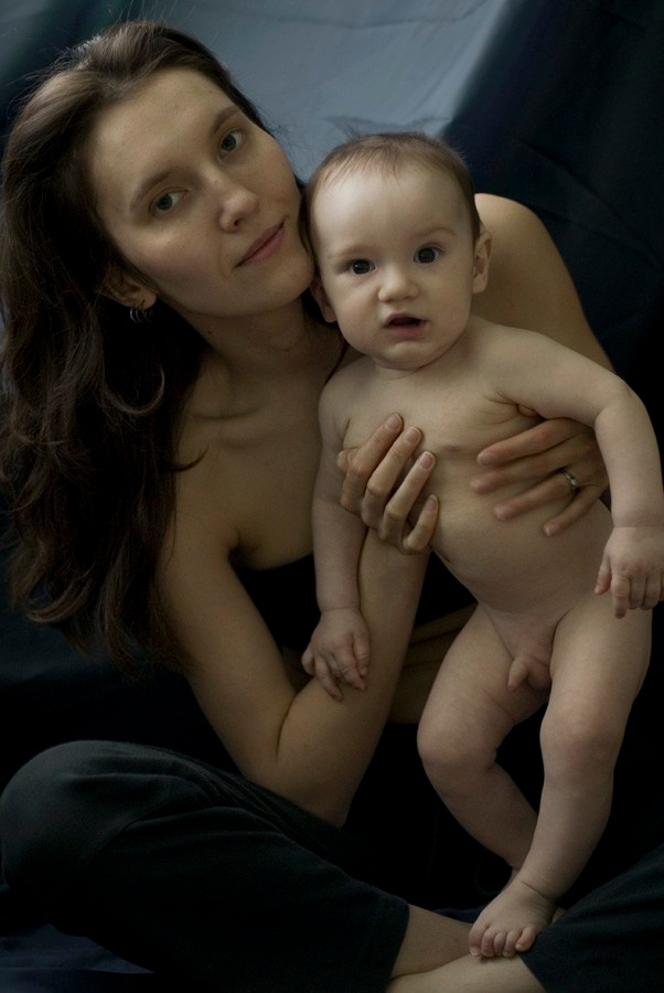 Photography portrait of a mother with a child made in an old-style painting