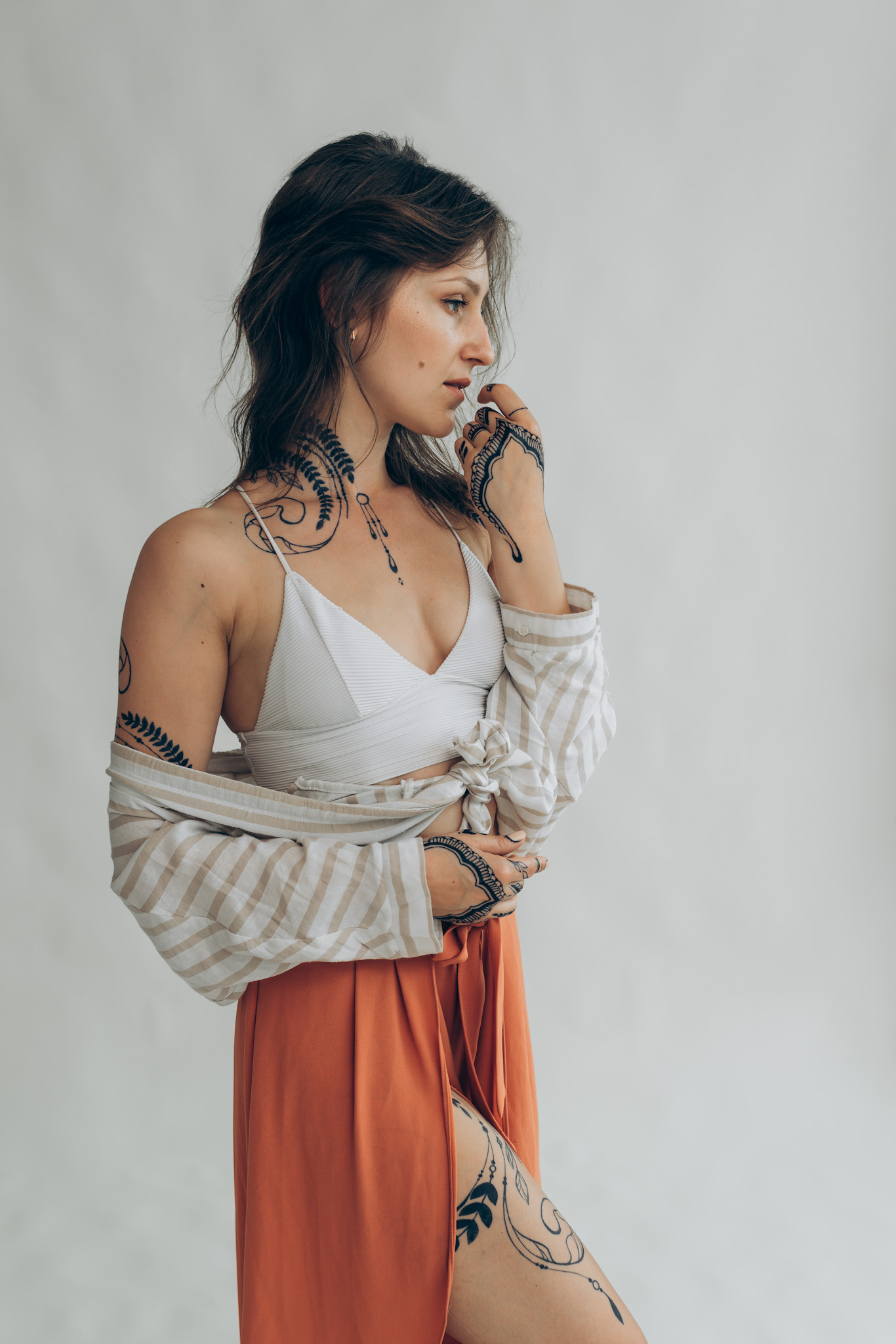 Henna tattoo on girl's shoulder arm